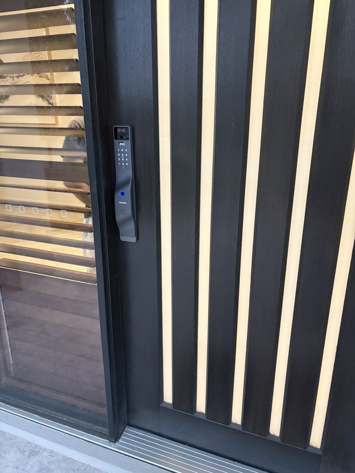 Guardian smart lock fitted to a Queensland entry door